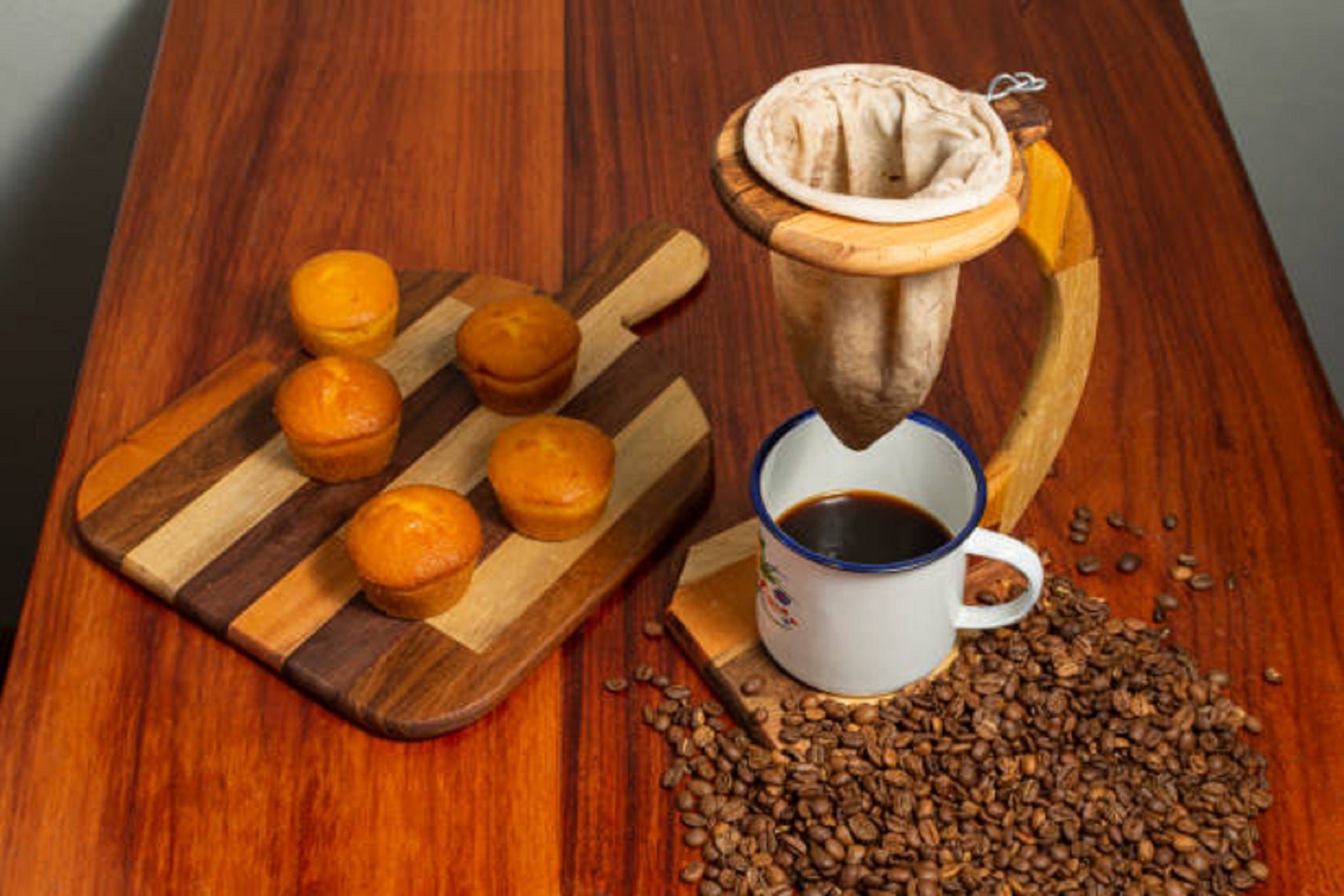 Coffee Brewed with Costa Rican Chorreador Next to Muffins Coffee Brewed with Costa Rican Chorreador Next to Muffins